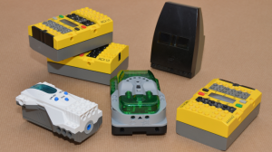 Three RCX, a Spybotics brick and a MicroScout.